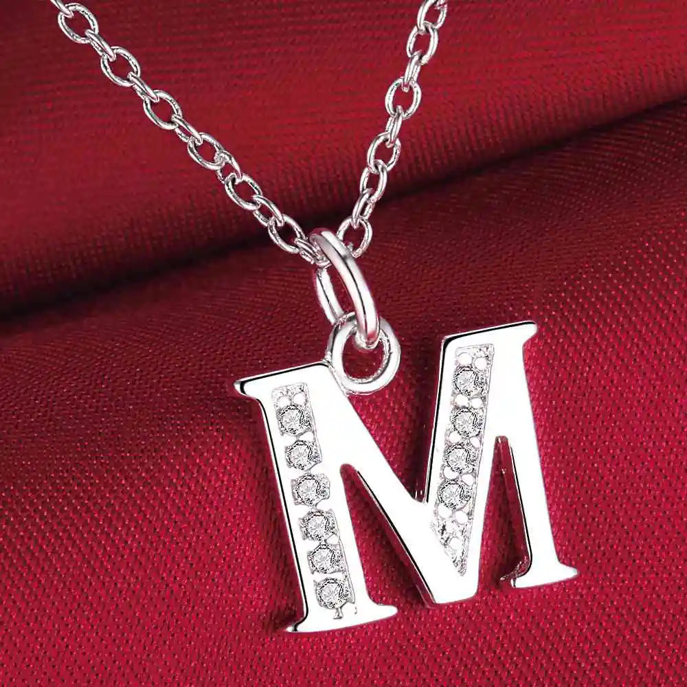 Necklace with initial letter pendant and rhinestones