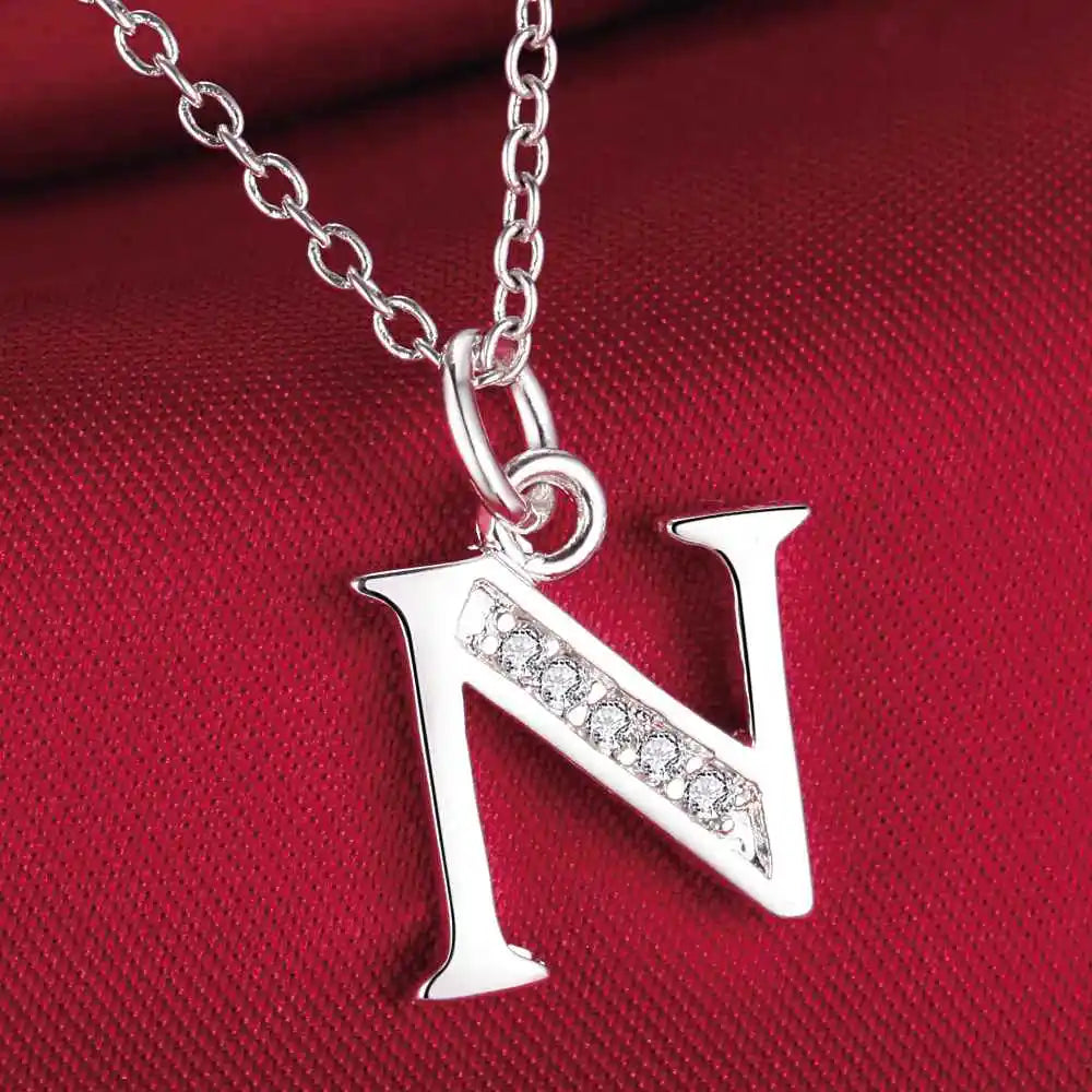 Necklace with initial letter pendant and rhinestones