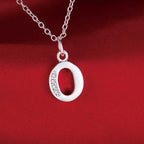 Necklace with initial letter pendant and rhinestones