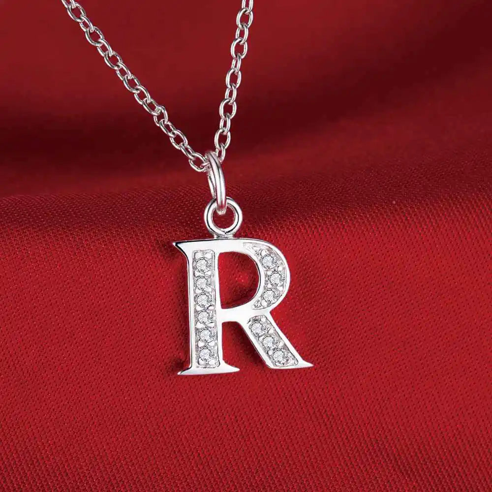Necklace with initial letter pendant and rhinestones