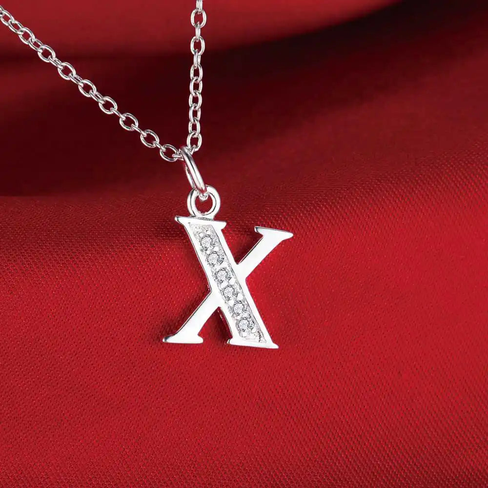 Collier long avec pendentif initiale  x