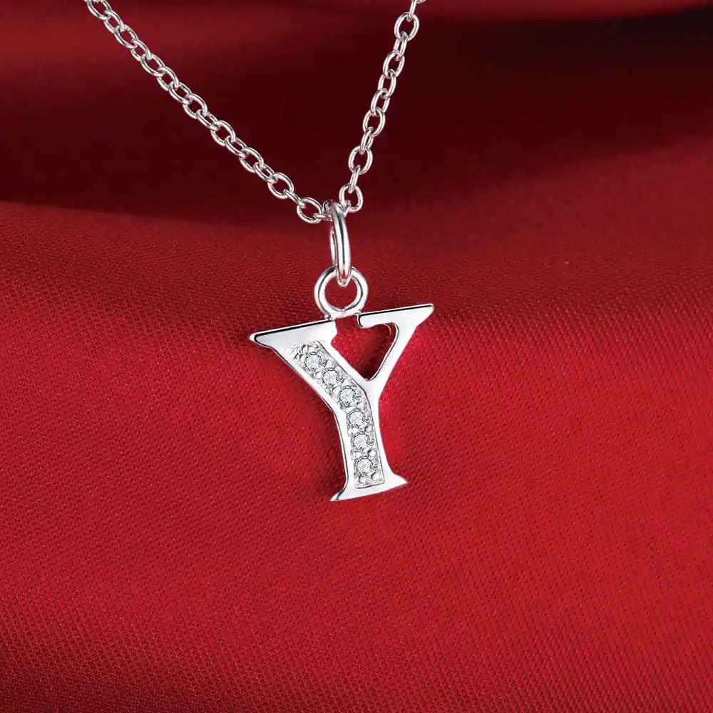 Necklace with initial letter pendant and rhinestones