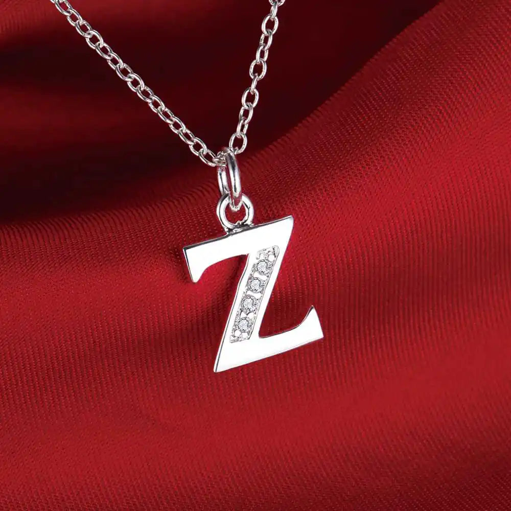 Necklace with initial letter pendant and rhinestones