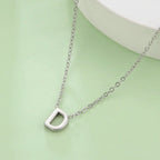 Collier avec pendentif initiale - lettre