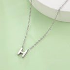 Collier avec pendentif initiale - lettre