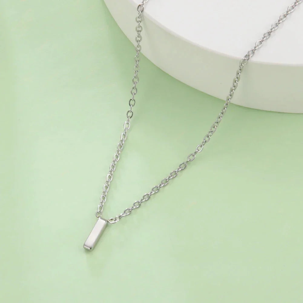 Collier avec pendentif initiale - lettre