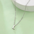 Collier avec pendentif initiale - lettre
