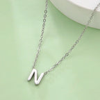 Collier avec pendentif initiale - lettre