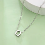 Collier avec pendentif initiale - lettre