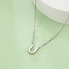 Collier avec pendentif initiale - lettre