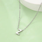 Collier avec pendentif initiale - lettre