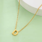 Collier avec pendentif initiale - lettre