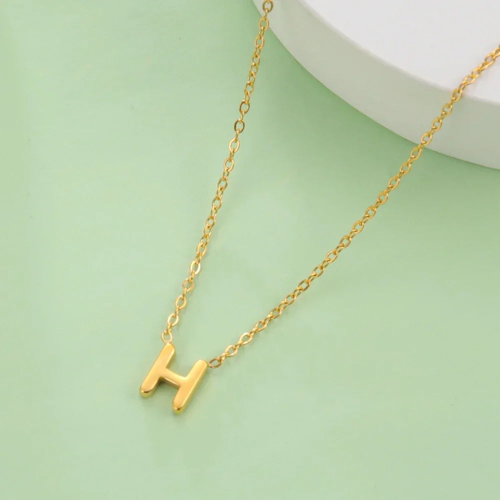 Collier avec pendentif initiale - lettre