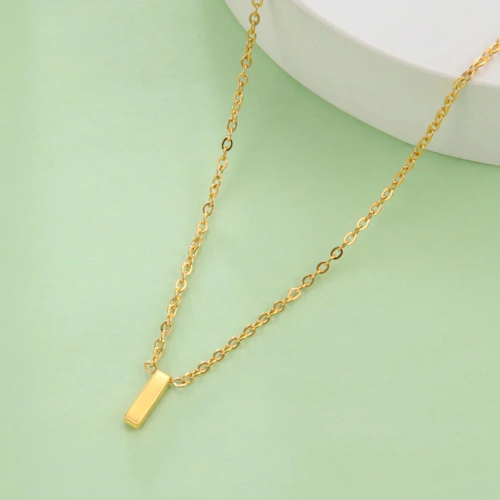 Collier avec pendentif initiale - lettre