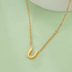 Collier avec pendentif initiale - lettre