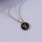 Collar con colgante negro inicial - letra 