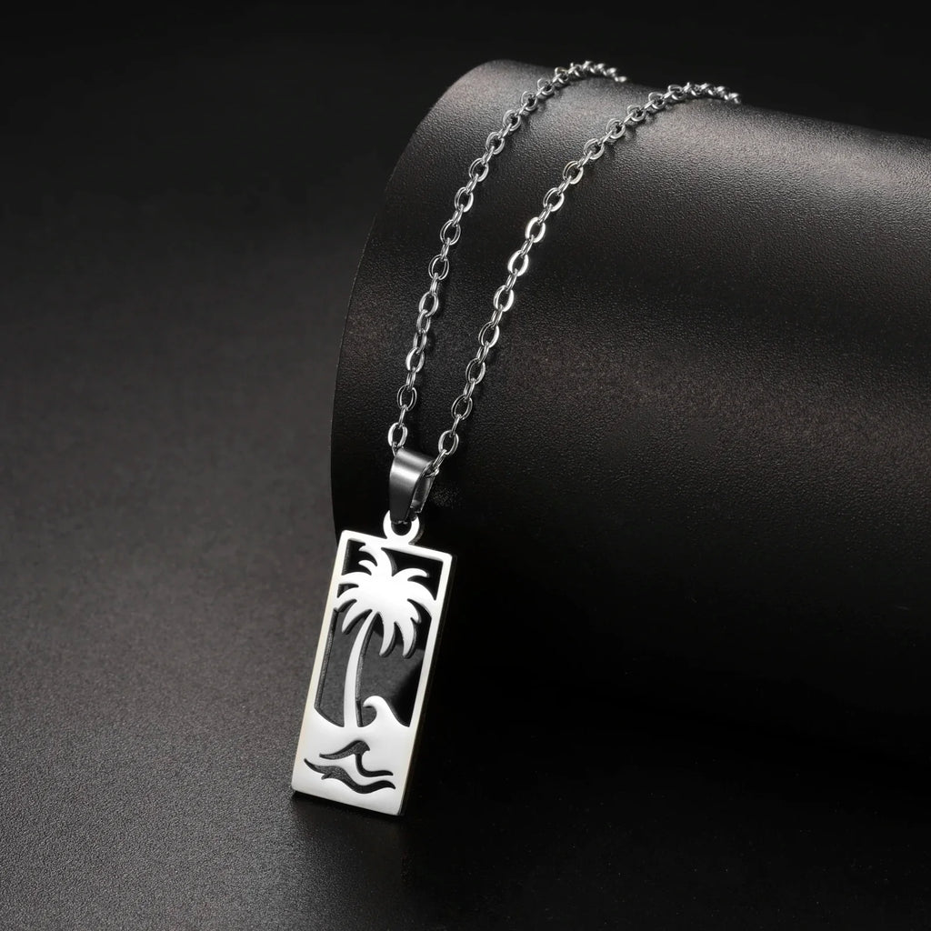 Necklace with palm tree pendant and beach wave