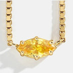 Necklace with an eye-shaped birthstone pendant