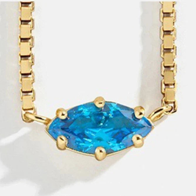 Necklace with an eye-shaped birthstone pendant