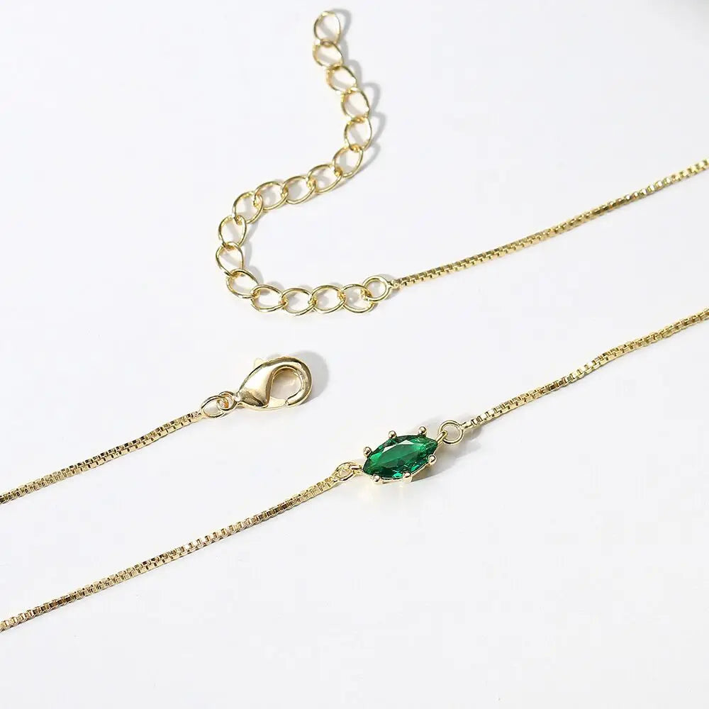 Collier avec pendentif pierre de naissance en forme d'oeil
