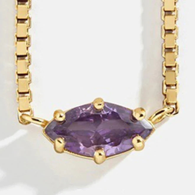 Necklace with an eye-shaped birthstone pendant