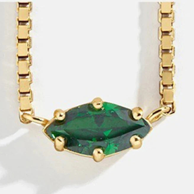 Necklace with an eye-shaped birthstone pendant