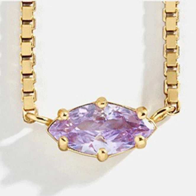 Necklace with an eye-shaped birthstone pendant
