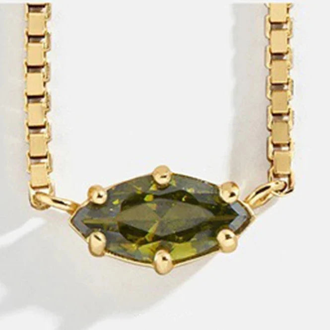 Necklace with an eye-shaped birthstone pendant