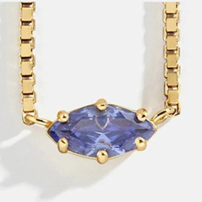 Necklace with an eye-shaped birthstone pendant
