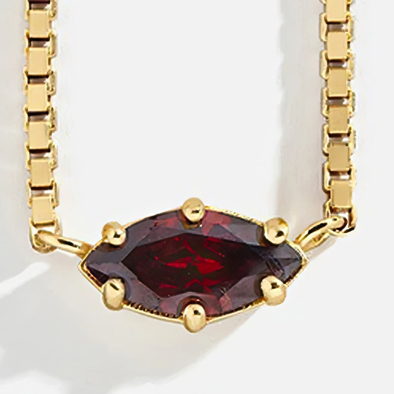 Collier avec pendentif pierre de naissance en forme d'oeil