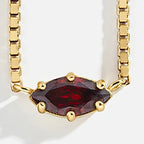 Collier avec pendentif pierre de naissance en forme d'oeil