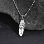 Necklace with small palm tree and sea pendant