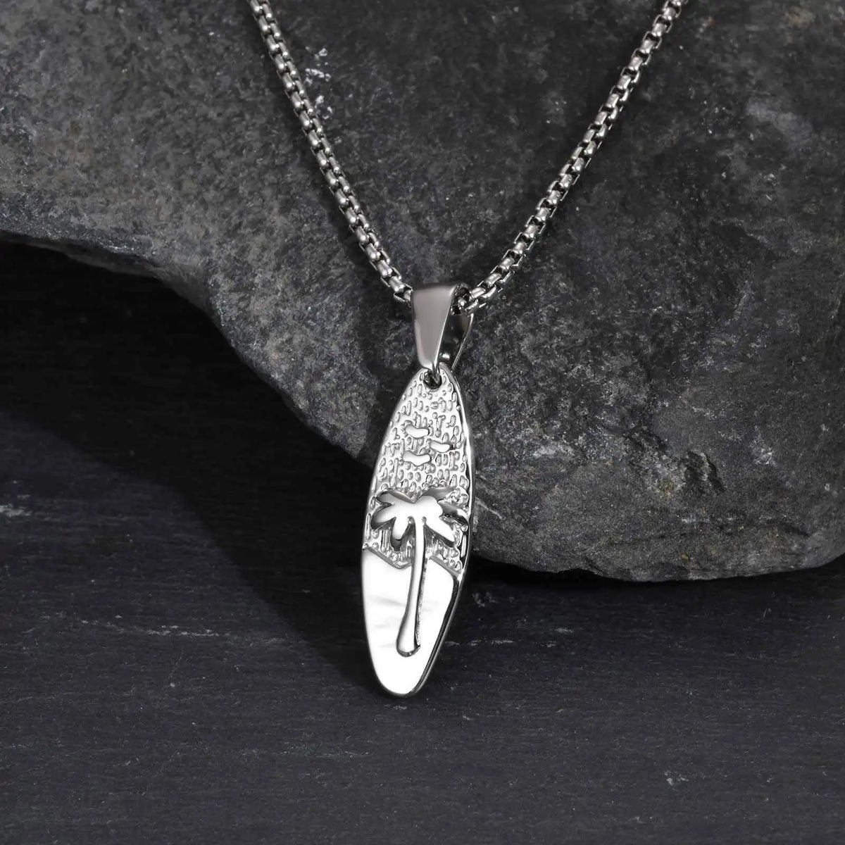 Necklace with small palm tree and sea pendant