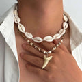 Set of 2 bohemian necklaces with shells and shark tooth pendant