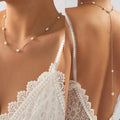 Collier de dos avec perles blanches - chaîne dorsale pour femme