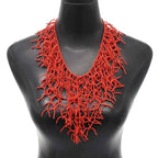 Necklace and coral bib pendant