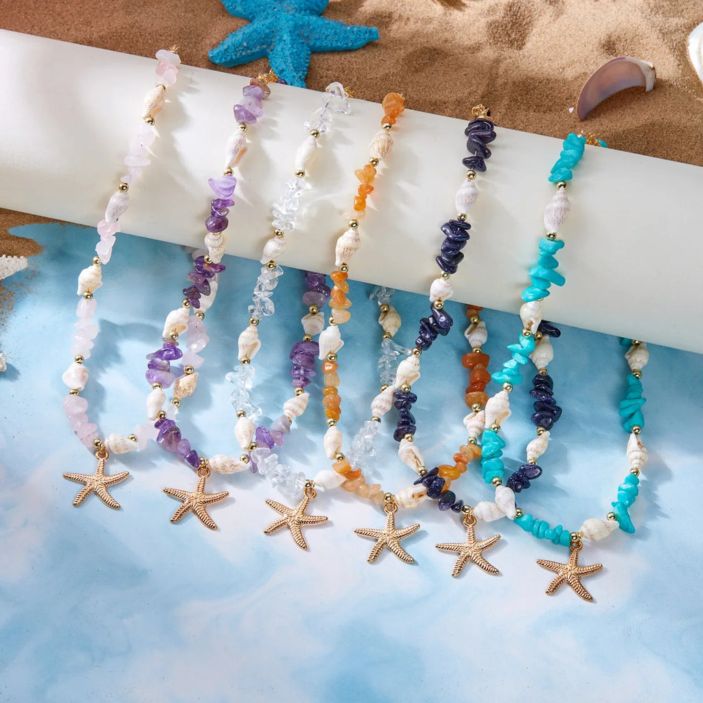 Collier et son pendentif coquillage pour femme violet