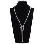 Long necklace with knot pendant