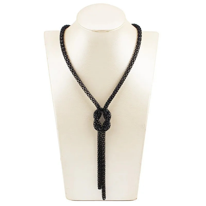 Long necklace with knot pendant
