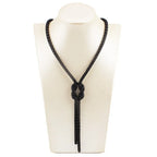 Long necklace with knot pendant
