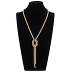 Long necklace with knot pendant