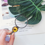 Collier Loupe Grossissante