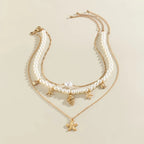Multi-Strand Necklace with Shell and Starfish Pendants