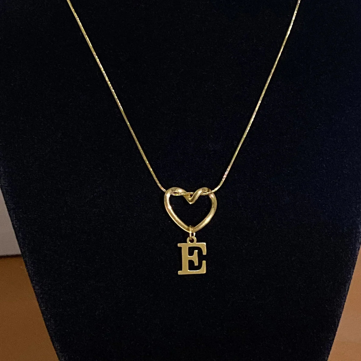 Choker necklace with initial letter and heart pendant