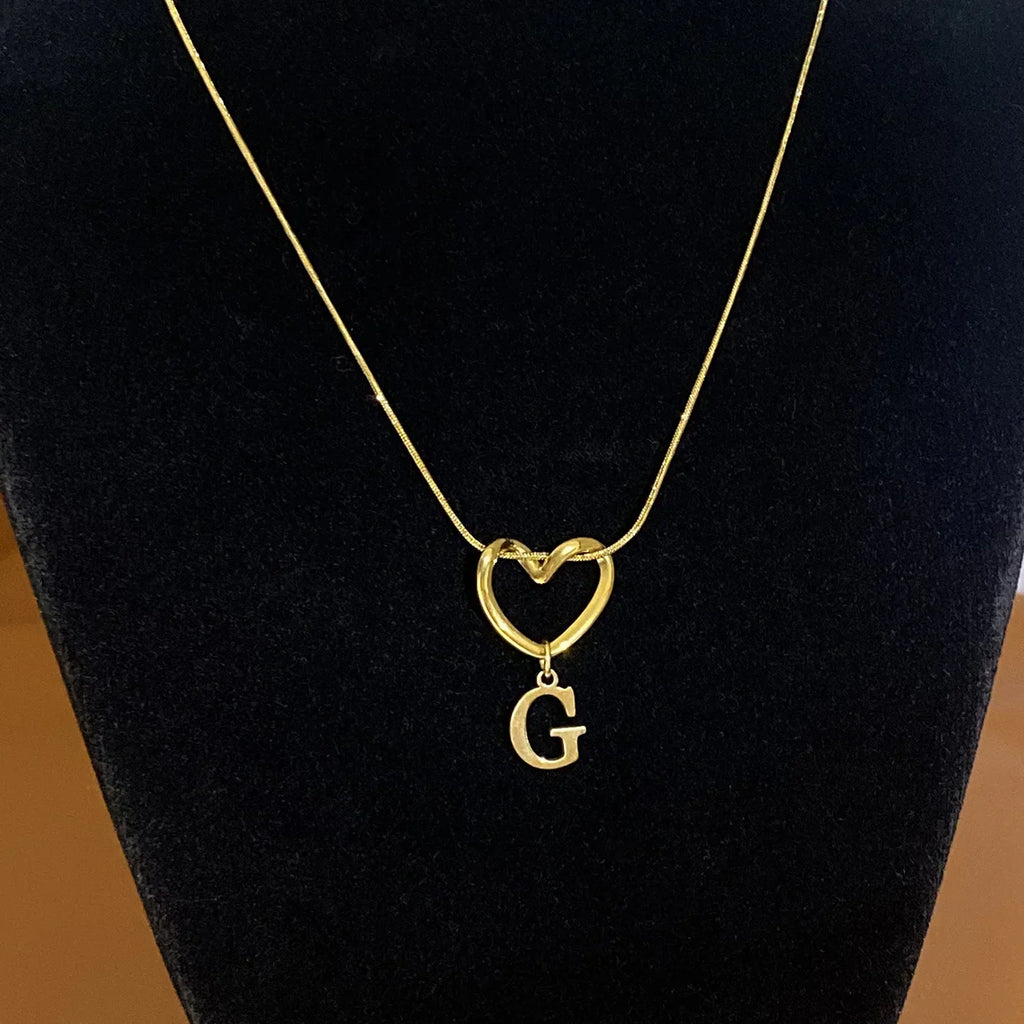 Choker necklace with initial letter and heart pendant