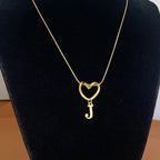 Choker necklace with initial letter and heart pendant
