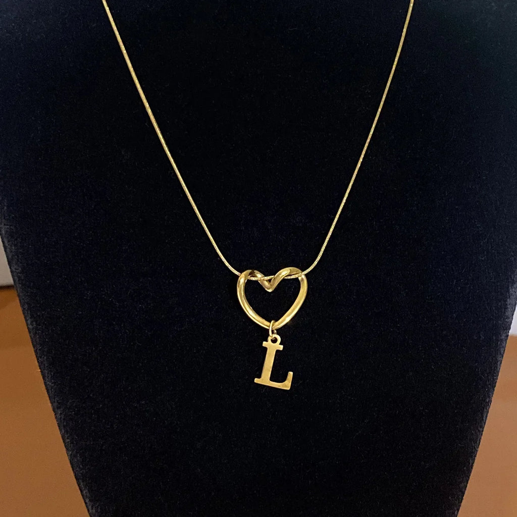 Choker necklace with initial letter and heart pendant
