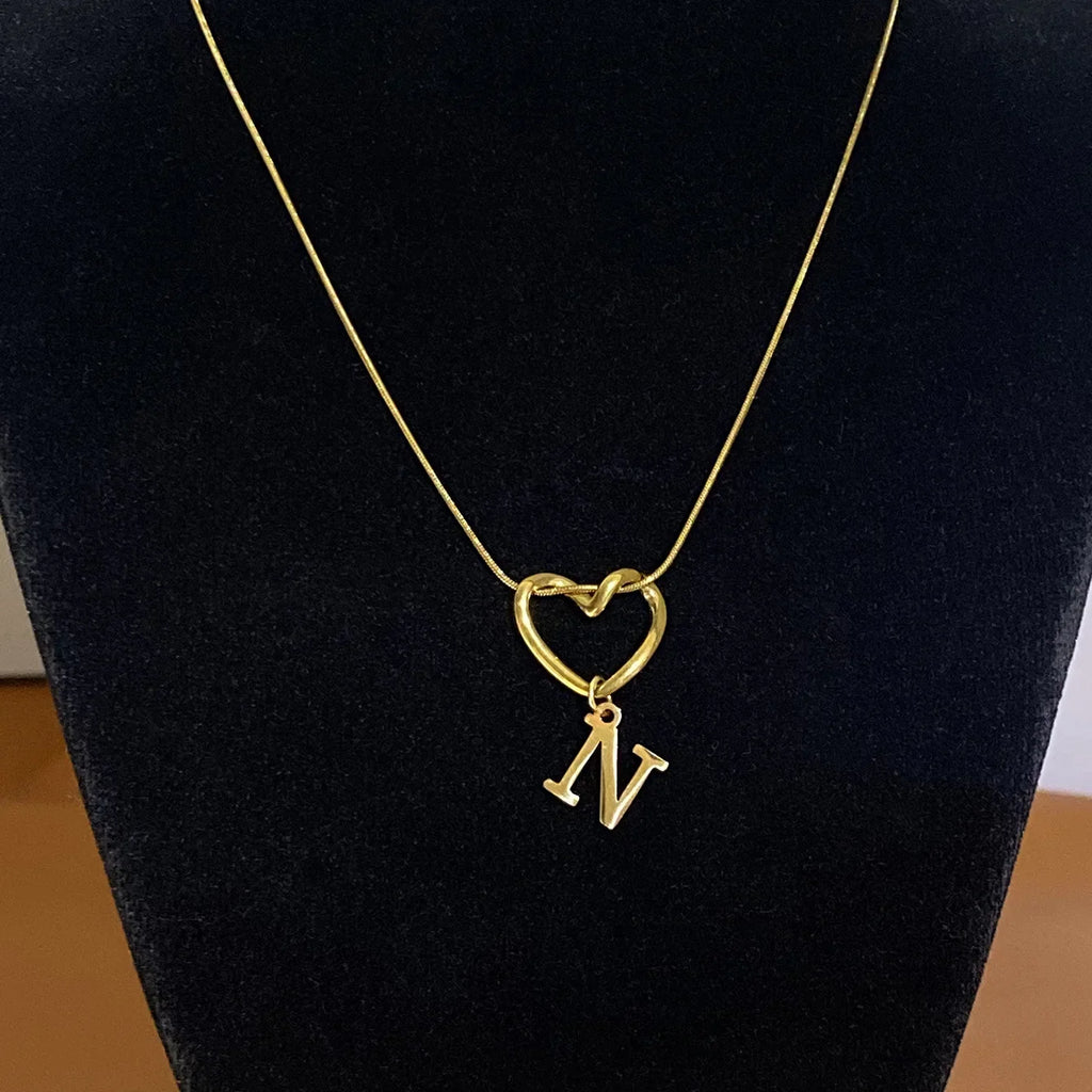 Choker necklace with initial letter and heart pendant