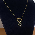 Choker necklace with initial letter and heart pendant