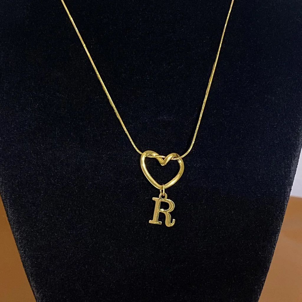 Choker necklace with initial letter and heart pendant